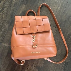 Brown faux leather backpack with gold details